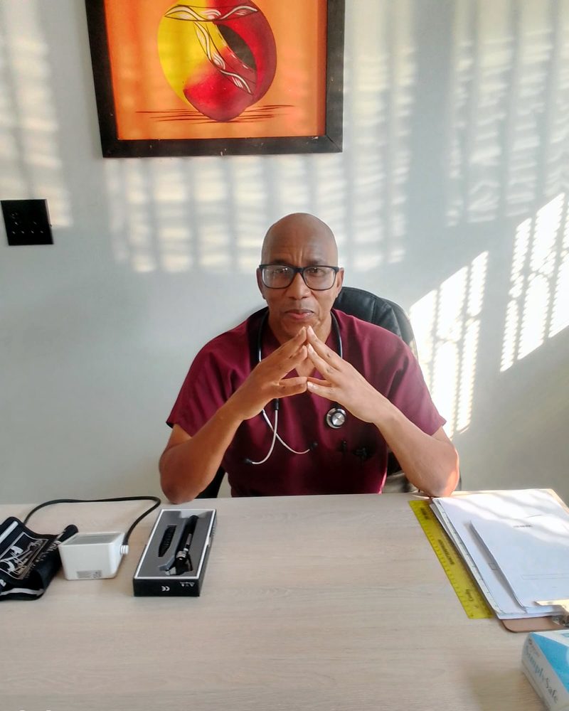 Portrait of Dr Tebogo Setlogelo, family medicine practitioner at Kelebogile Medical Centre